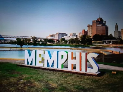 Memphis sign on the riverfront with the downtown skyline